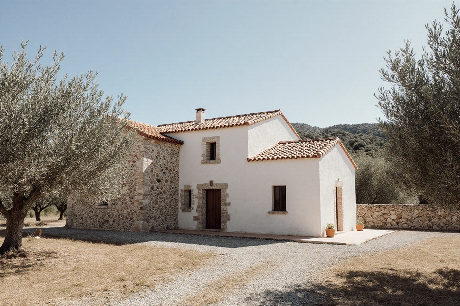 Mallorcan country house with stone walls and surrounding grounds